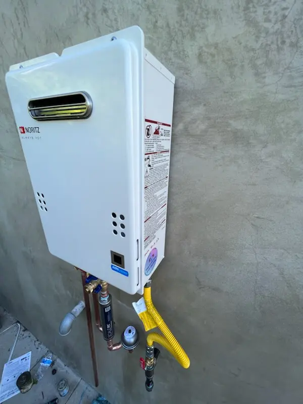 Tankless water heater installation for One Hundred One Pines homes